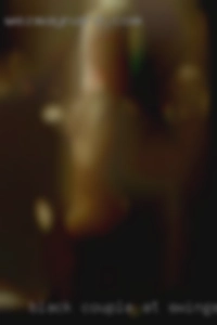 black couple at swinger party